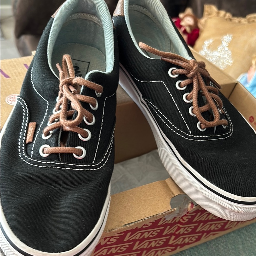 Vans Black and White Low-Top Sneakers with Durable Sole